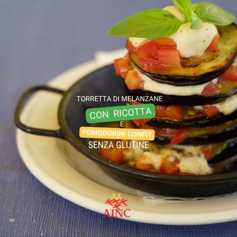 Torretta di melanzane con crema di ricotta e pomodorini confit